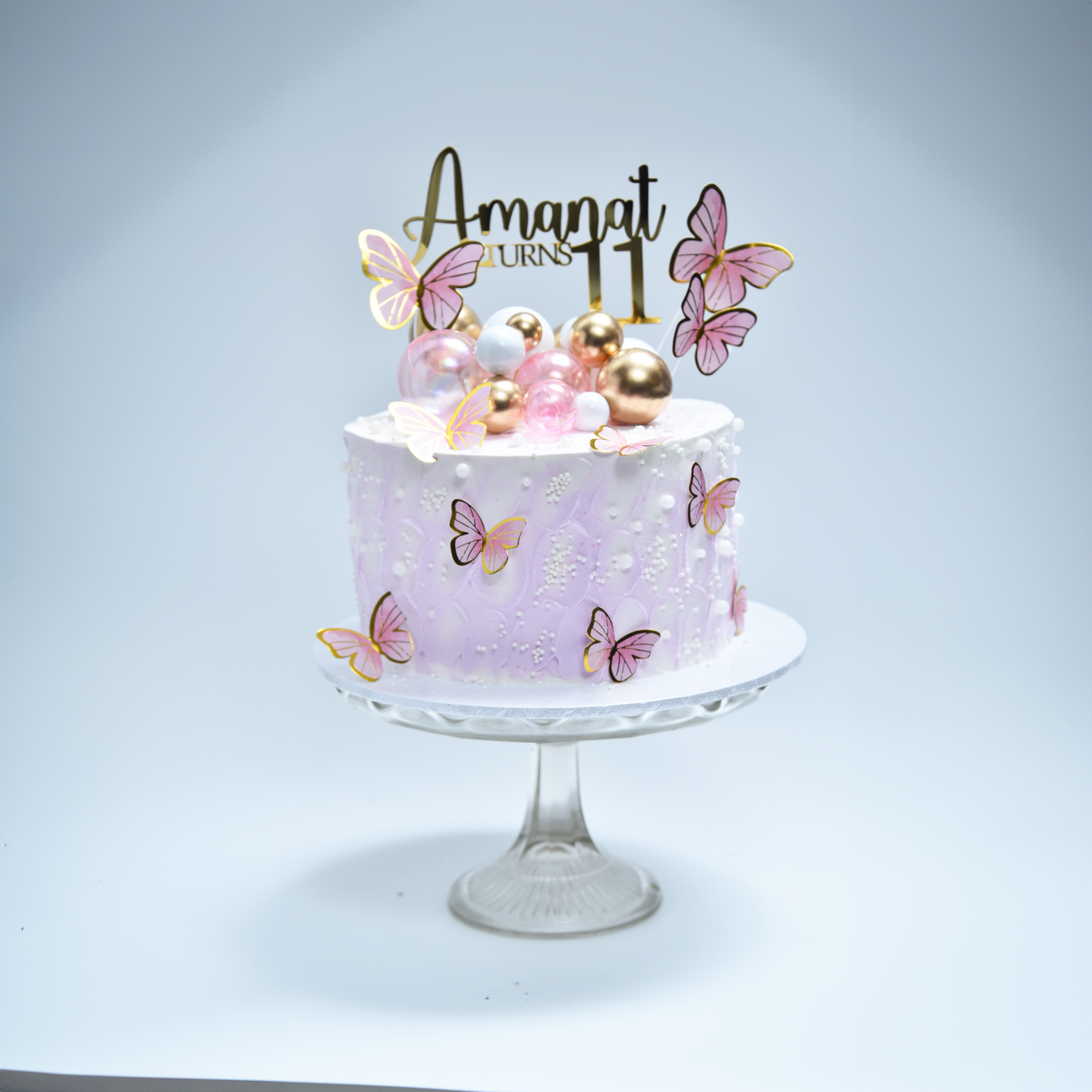 Butterfly magic including custom topper (Available in fresh cream icing or Buttercream)